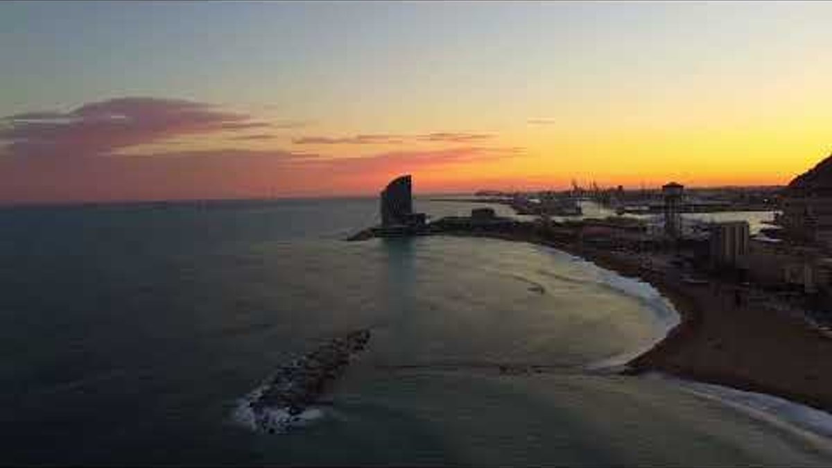 Barceloneta Beach Sunset and Promenade: Barcelona's Waterfront at Golden Hour beach view